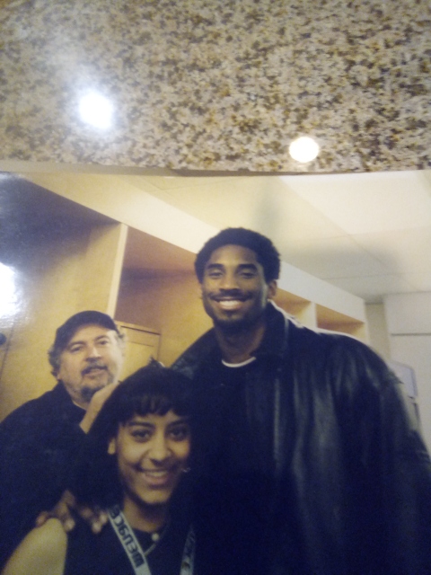 Journalism Adviser Kristen Hunter Flores poses with Kobe Bryant in his second year with the Lakers. 