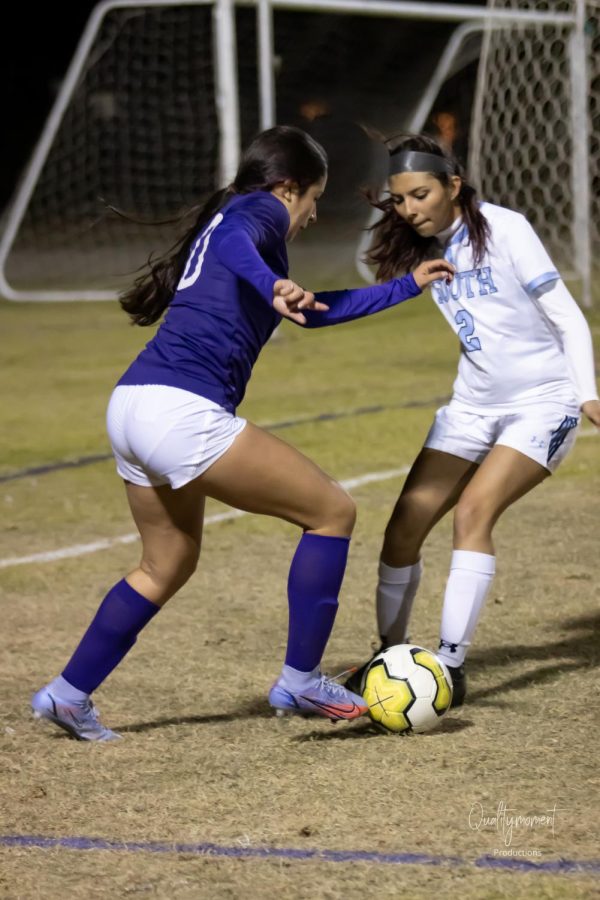 Kristen Gonzales on the field at a previous game attacking the opposing defender