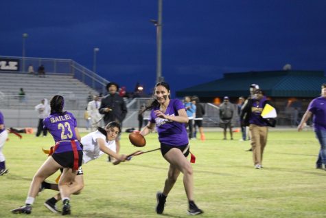 Senior Navejot Gill running the ball during the Powderpuff game..