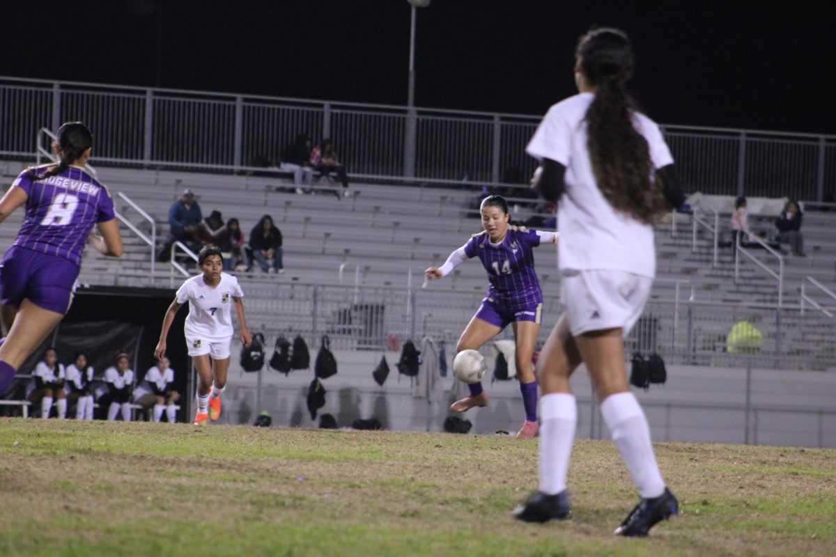 Sofia Quintero trying to maintain control of the ball against Foothill 