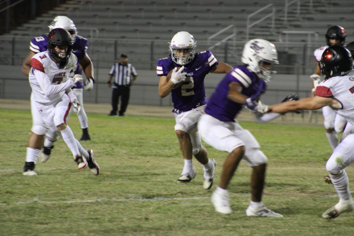 Running back Jon Guiterez tries to run for a touchdown at a recent game