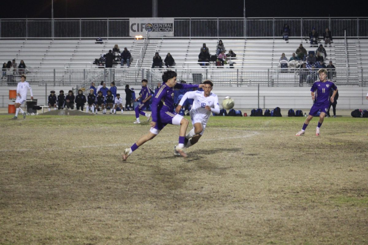 Ridgeview boy soccer player running to score a goal.