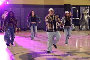 Sophomore class singing and dancing during the rally 