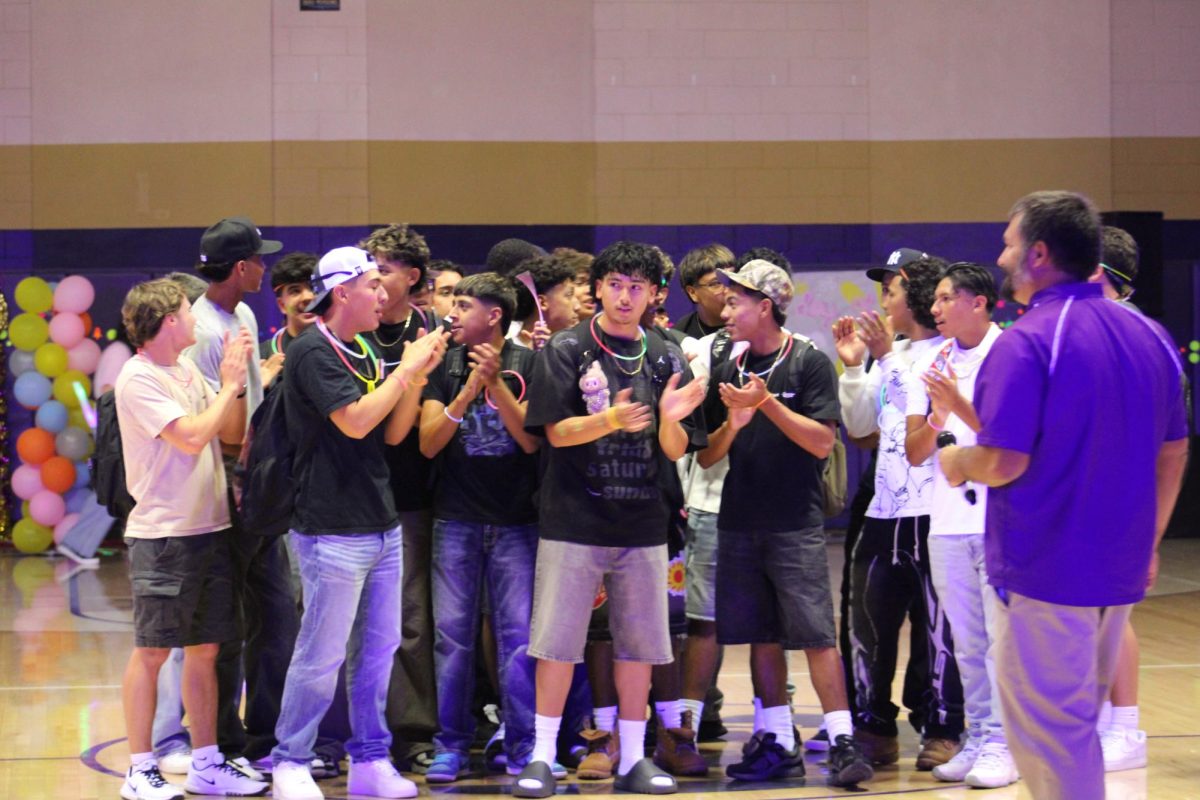 Baseball celebrates their state championship win at the welcome back rally.