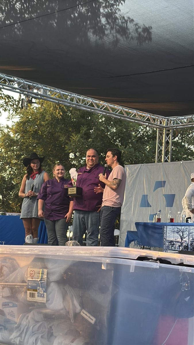 Hailie Burnett getting awarded at the Kern County Fair for winning a impressive culinary battle.