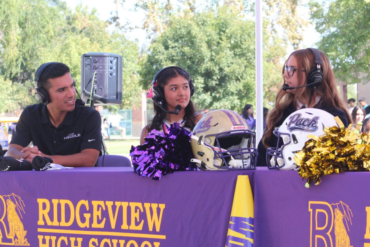 Angelina Hernandez representing cheer at the In the Huddle interview.