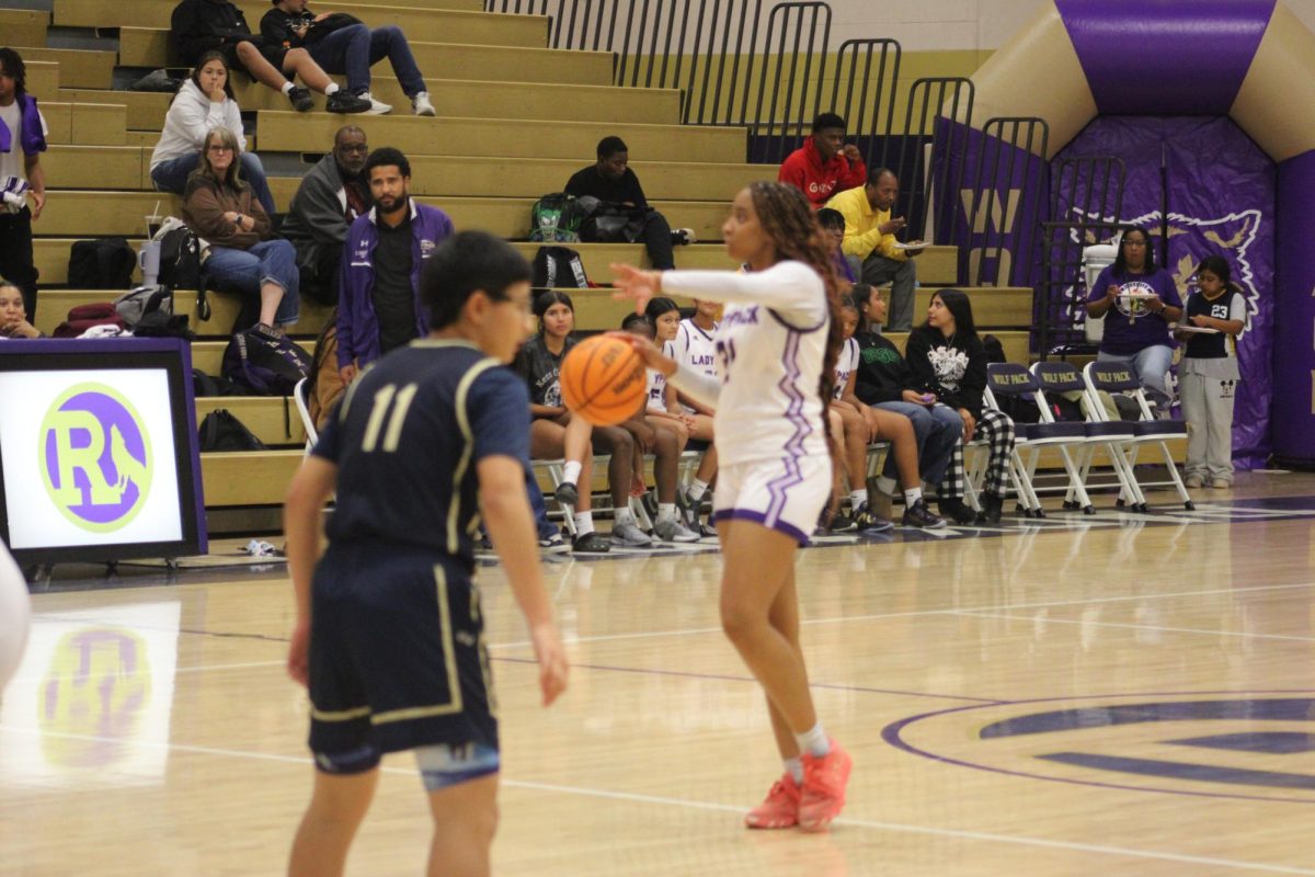 Nyla Jackson calling a play against Golden Valley High School.
