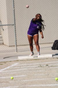 Keyli Colbert throwing shot-put at a recent track event